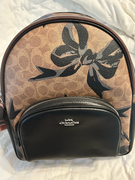 Coach Handbags - Coach Brown Canvas  Backpack with Black Bow Motif